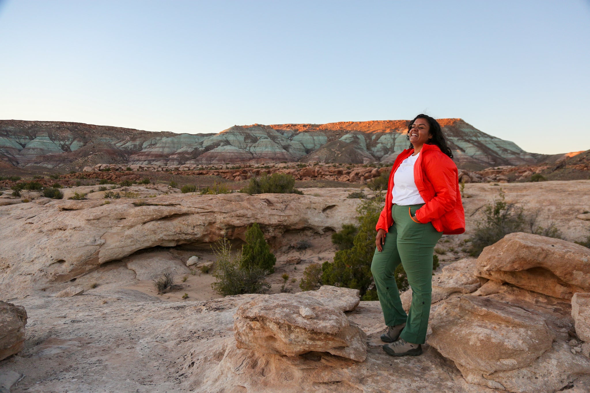 technical outdoor hiking pants in green on a plus size woman. plus size hiking pants. plus size apparel. plus size outdoor gear